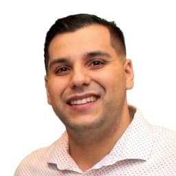 Christopher Bravo headshot Christopher Bravo headshot